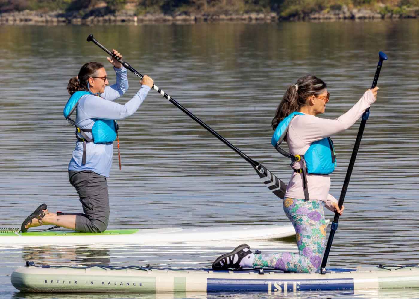 women on paddleboards