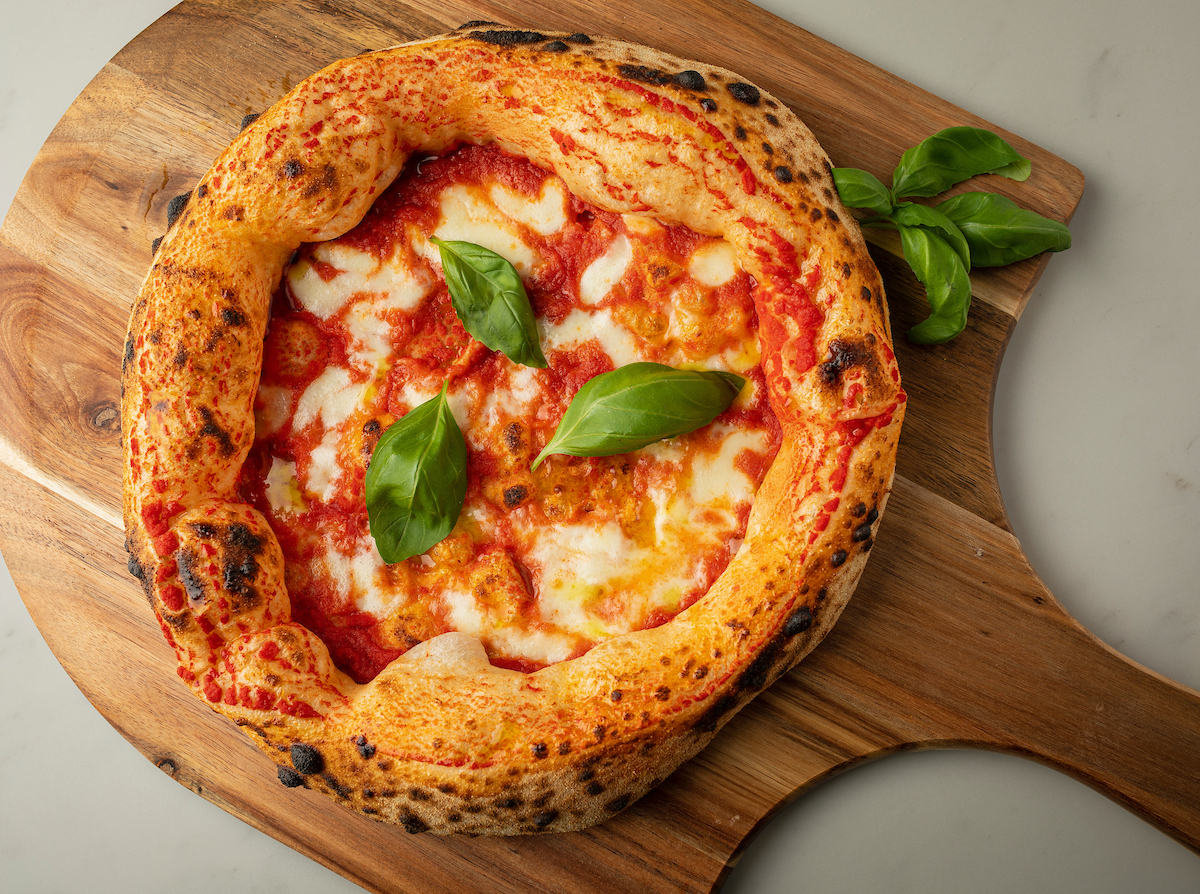 Piccolo Buco pizza on a cutting board