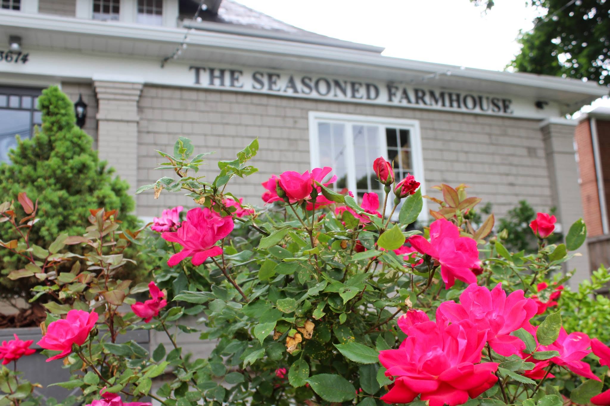Kids Cooking Classes In Columbus: 6 Spots For Young Chefs 5 pink flowers outside of the seasoned farmhouse building