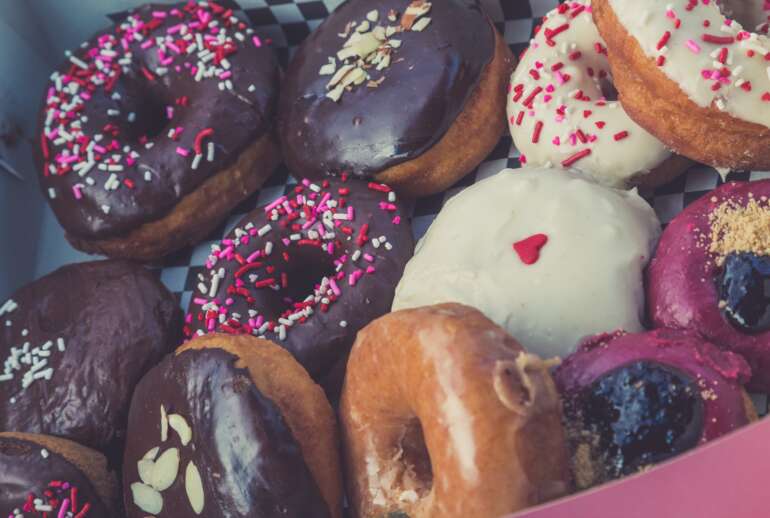 A Columbus Donut Shop Has Been Named One Of The Best In America 2 a dozen assorted vegan donuts in a box