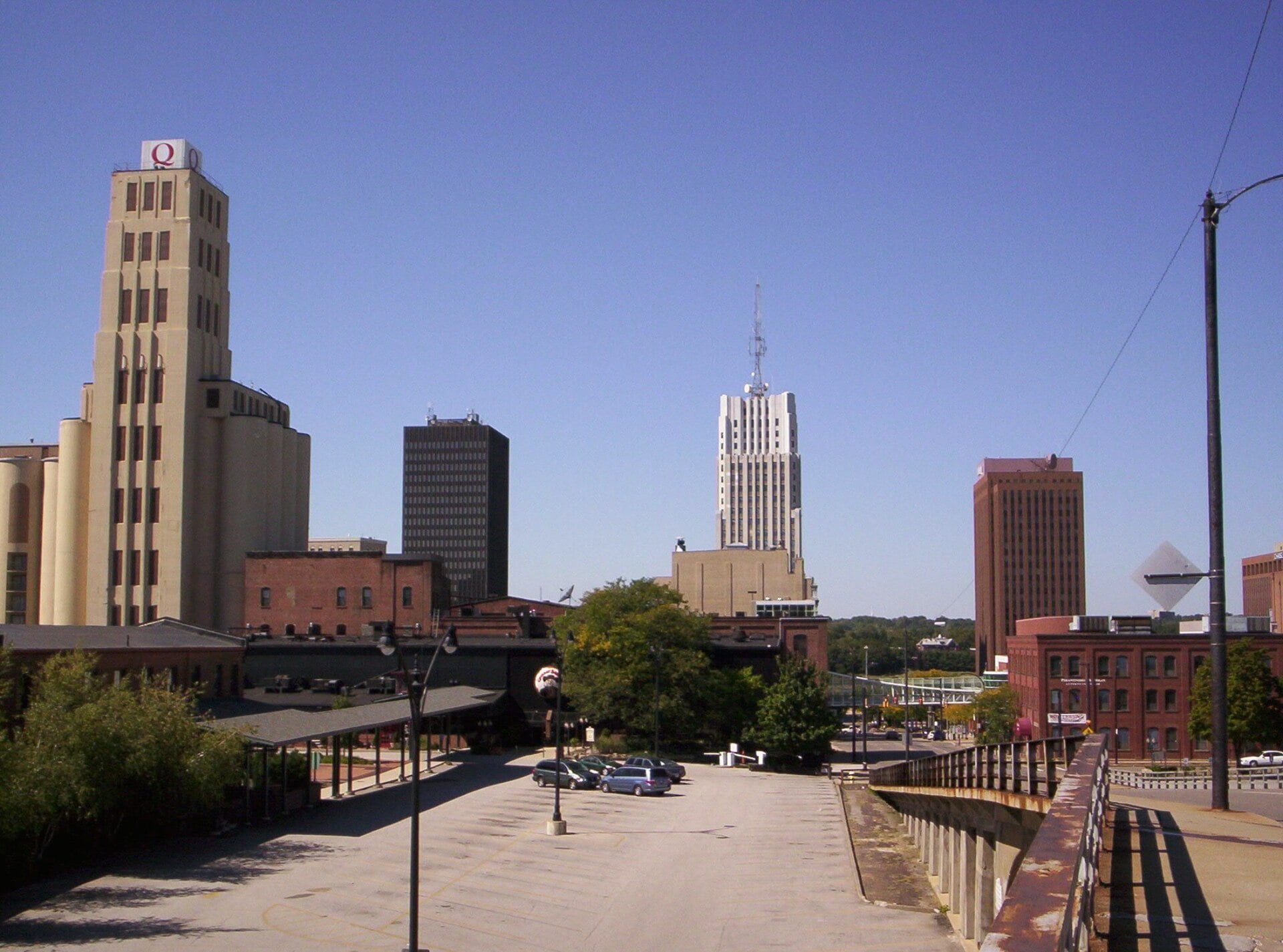 Downtown Akron skyline seen from a bridge over the rail corridor