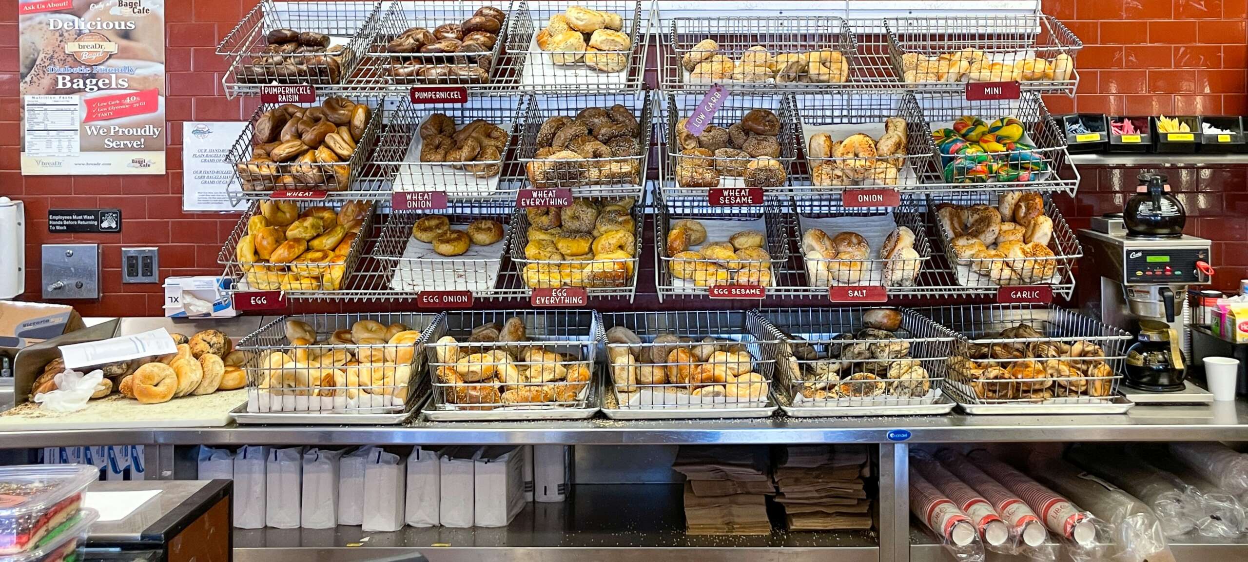 Trays of fresh bagels at a bagel cafe