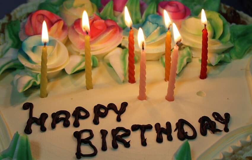 Birthday cake with lit candles