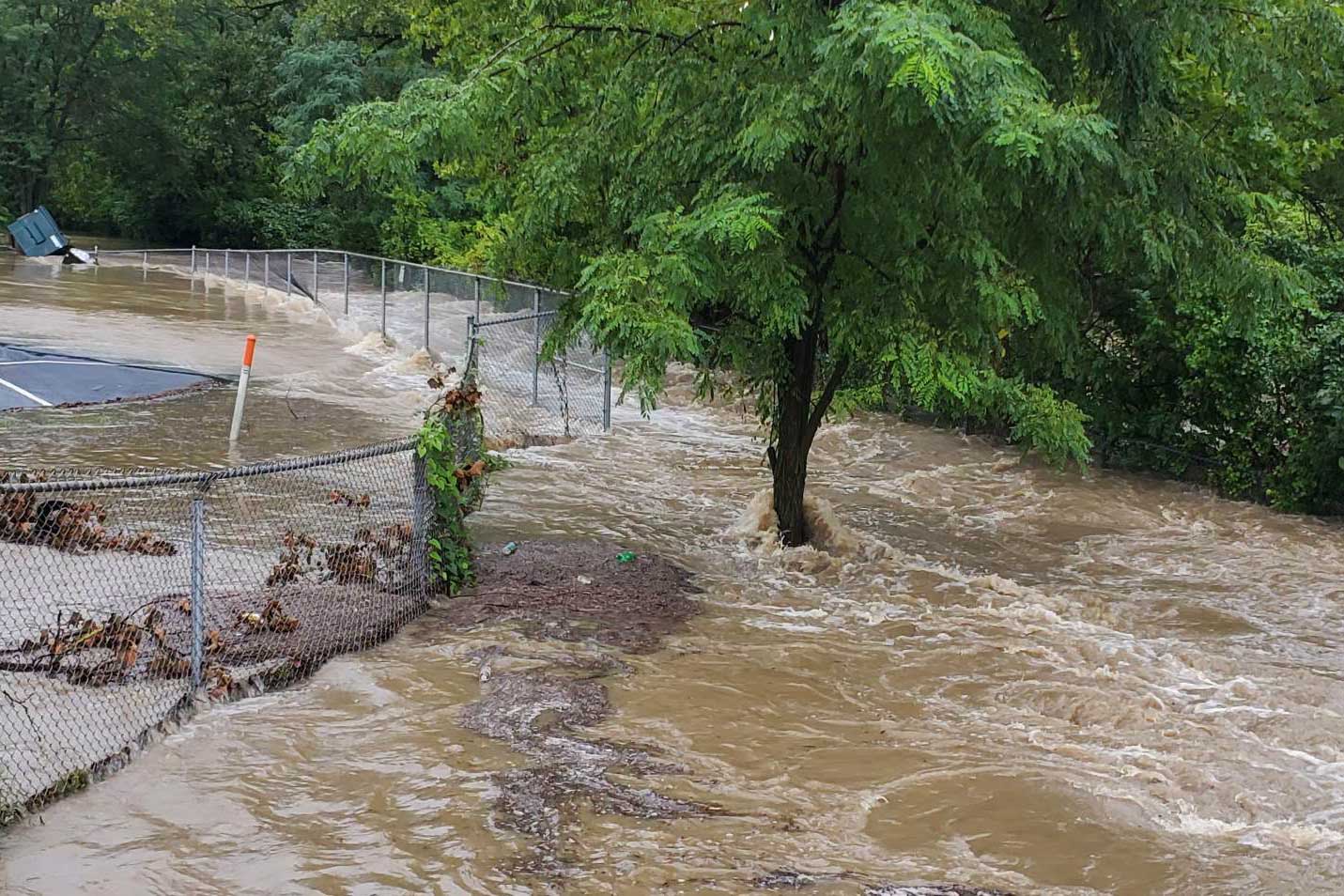 Here’s How Bad The Flooding Got Across Central Ohio 2 floodwaters rush down hill in reynoldsburg