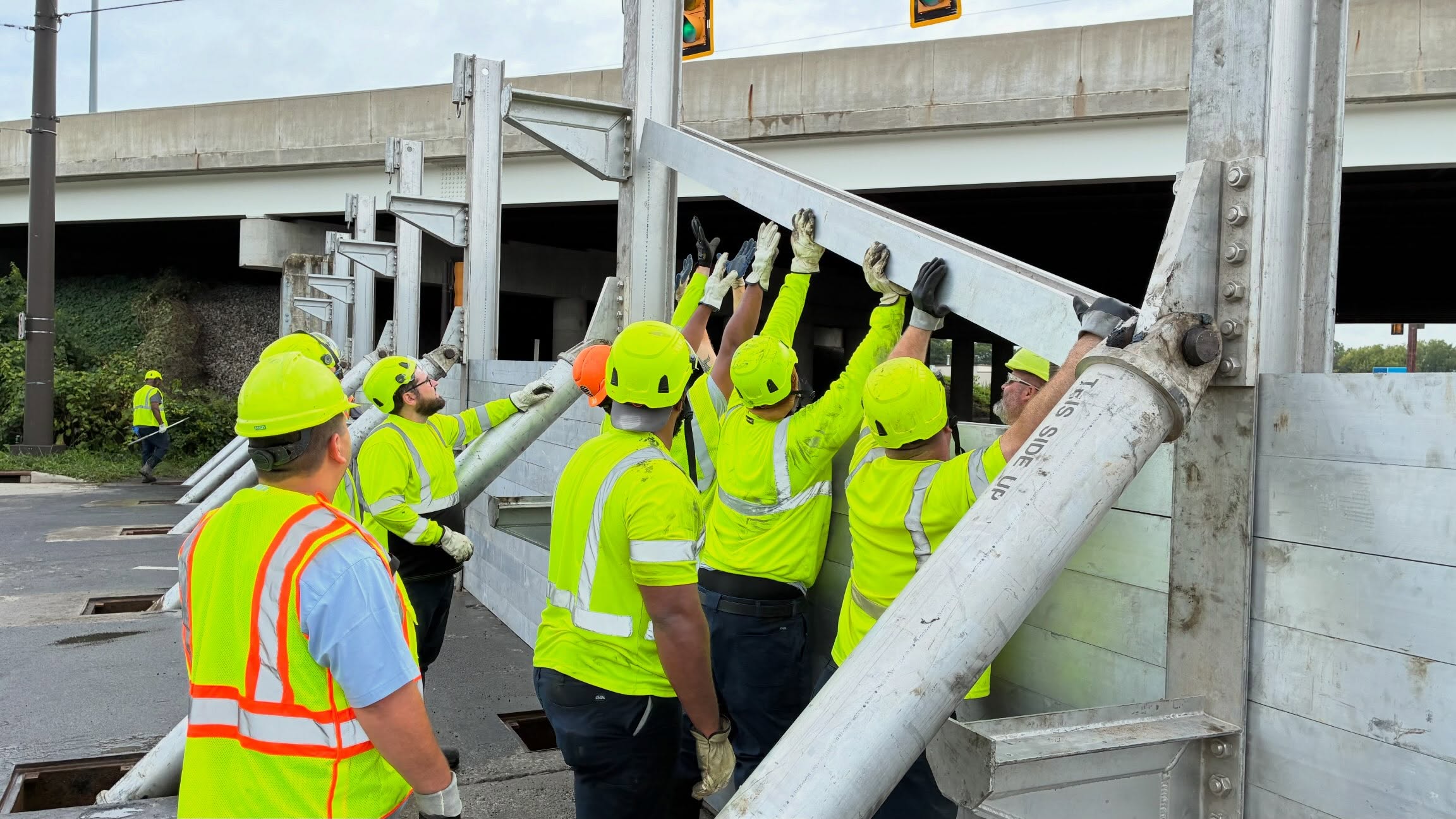 Here’s How Bad The Flooding Got Across Central Ohio 1 workers installing the floodwall in columbus