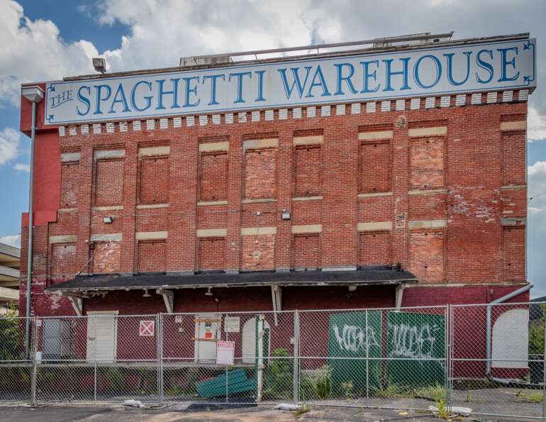 Abandoned And Beautiful: The Cool But Creepy Footage Of Columbus' Abandoned Buildings 5 Boarded windows and a painted Spaghetti Warehouse sign on the abandoned Crystal Ice Building in Columbus