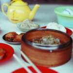 Dim sum dishes on a restaurant table