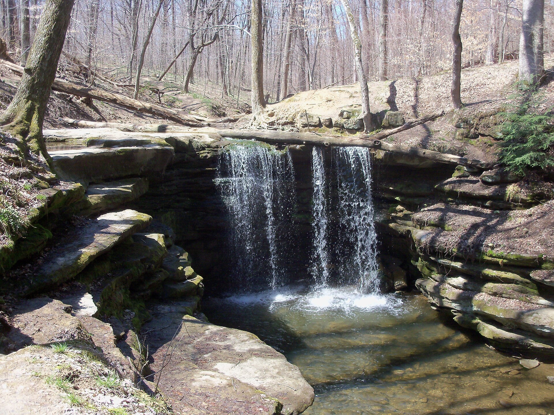 Water sliding across the rock shelf at Dundee Falls in Amish Country