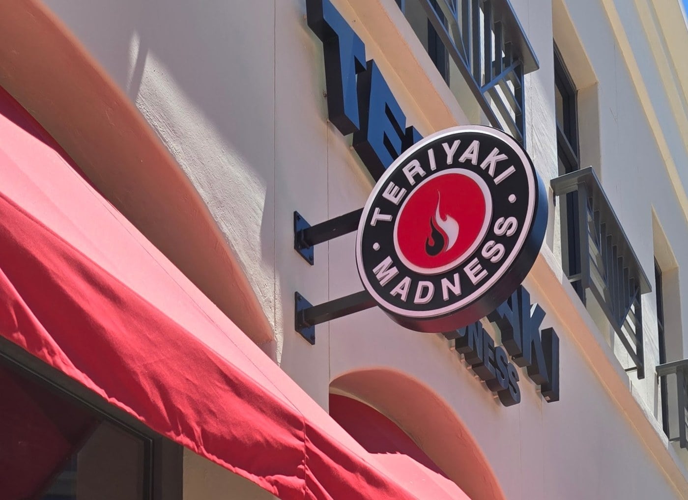Five New Stores Are Coming To Easton, Including A 15,000-Square-Foot MINISO Land 4 Teriyaki Madness sign and red awnings in Redwood City, California