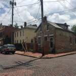 Brick street lined with historic homes in German Village