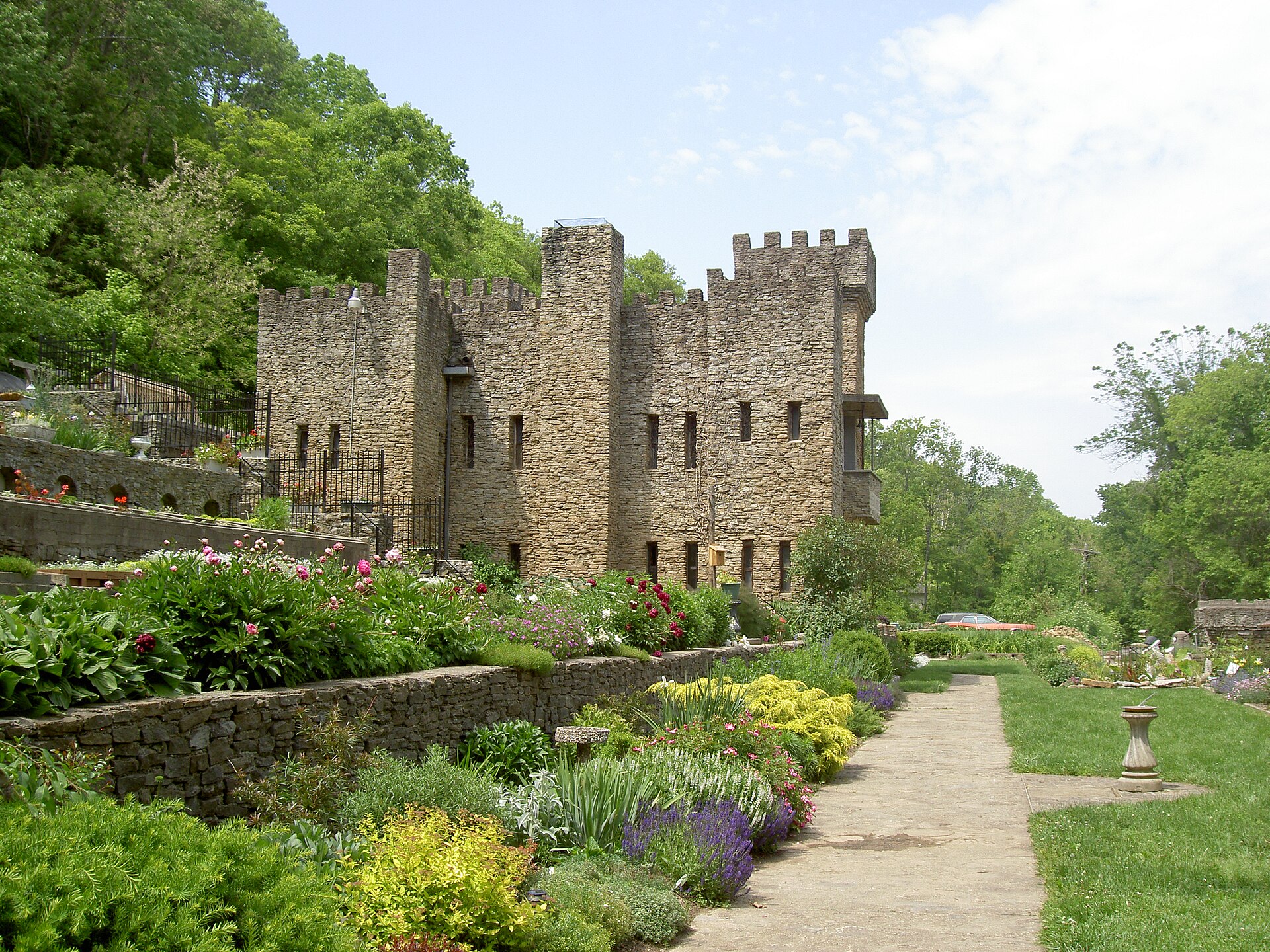 7 Unique Outdoorsy Day Trips Within 3 Hours Of Columbus 1 Loveland Castle stone towers above terraced flower gardens