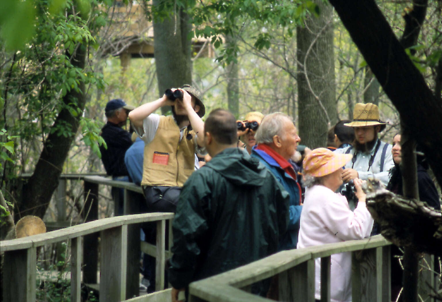 15 Ways To Make This Your Best Ohio Spring Yet 4 birdwatchers on the boardwalk at Magee Marsh Wildlife Area