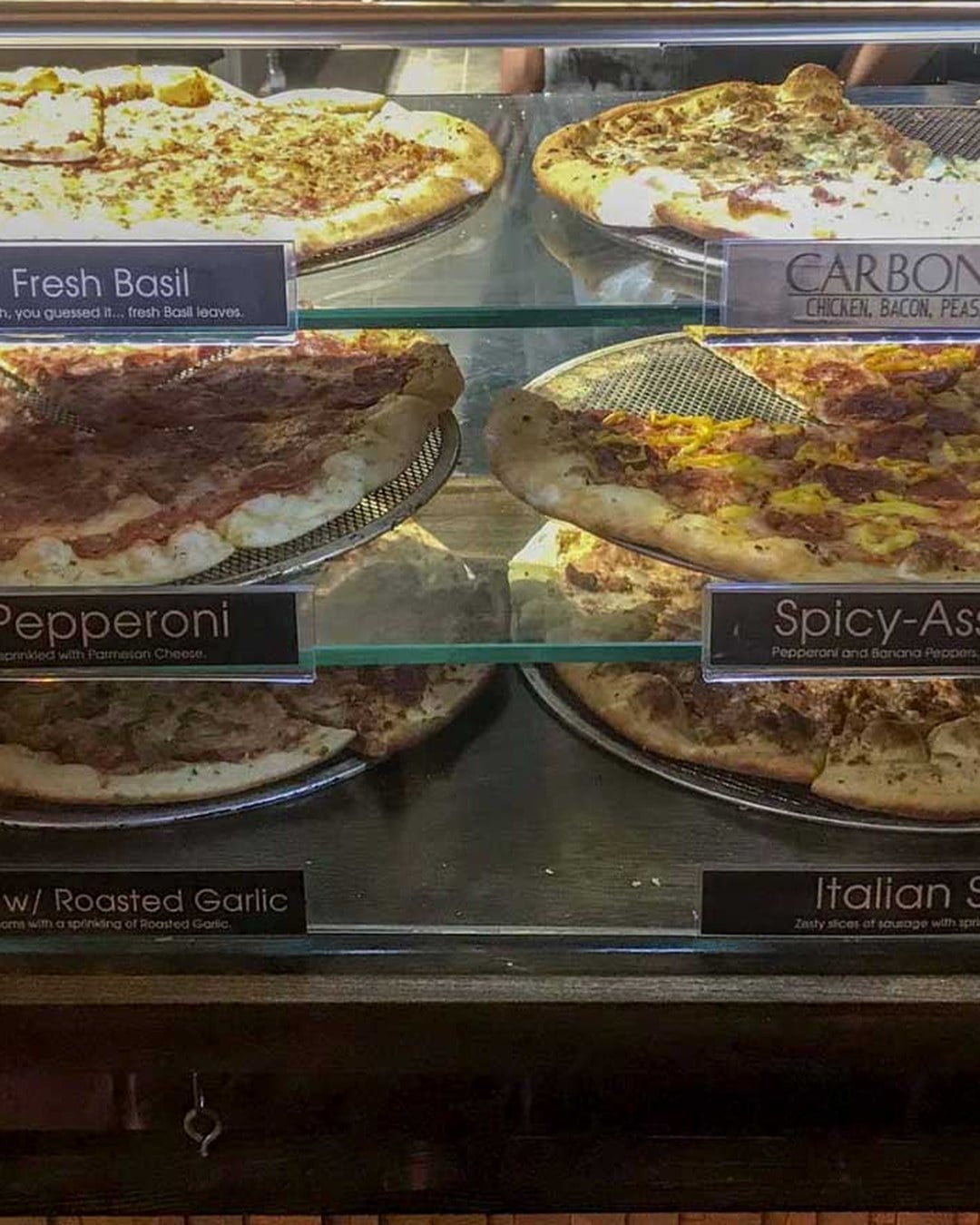 pizza display case at Mikeys Late Night Slice