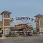 The Best Small Towns In Ohio For A Day Trip The Boardwalk entrance arch and golf carts at Put-in-Bay