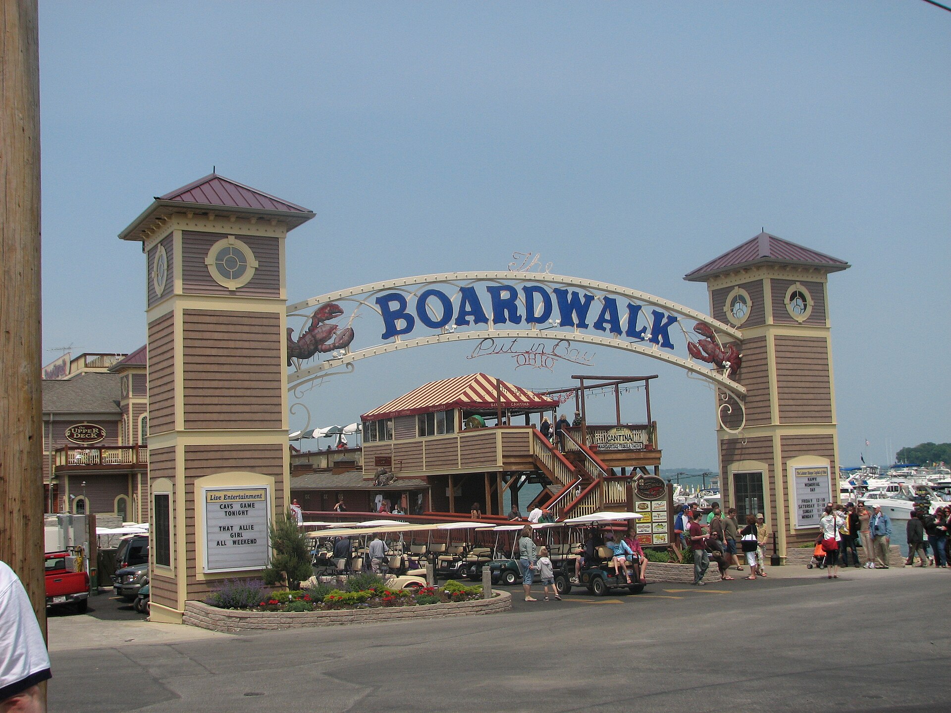 The Boardwalk entrance arch and golf carts at Put-in-Bay