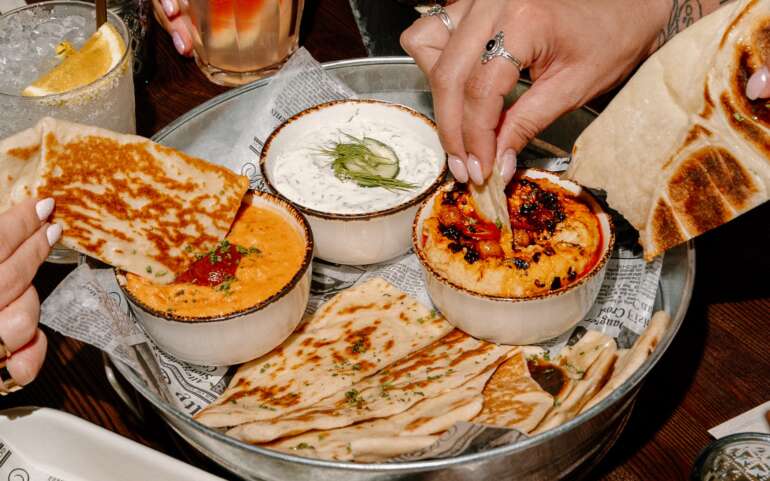 flatbread and dips on a tray at Sugar in Columbus