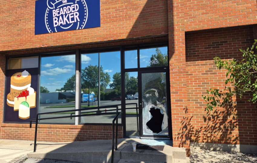 broken glass on bakery door after break-in