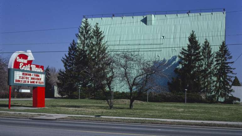 The Iconic Drive-In Theaters Of Columbus (And Where You Can Still Catch A Movie) 4 The East Main Drive-In marquee and screen tower in Columbus, photographed in 1980