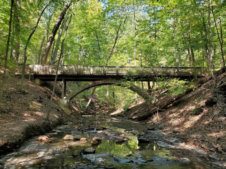 The Complete Guide To Columbus Metro Parks 5 Wooden arch bridge over a ravine at Highbanks Metro Park