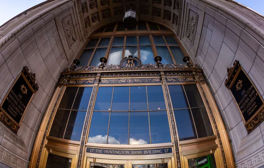 Bronze and glass High Street entrance of the Huntington National Bank Building in downtown Columbus, with the 17 Huntington Bank Building lettering over the doors