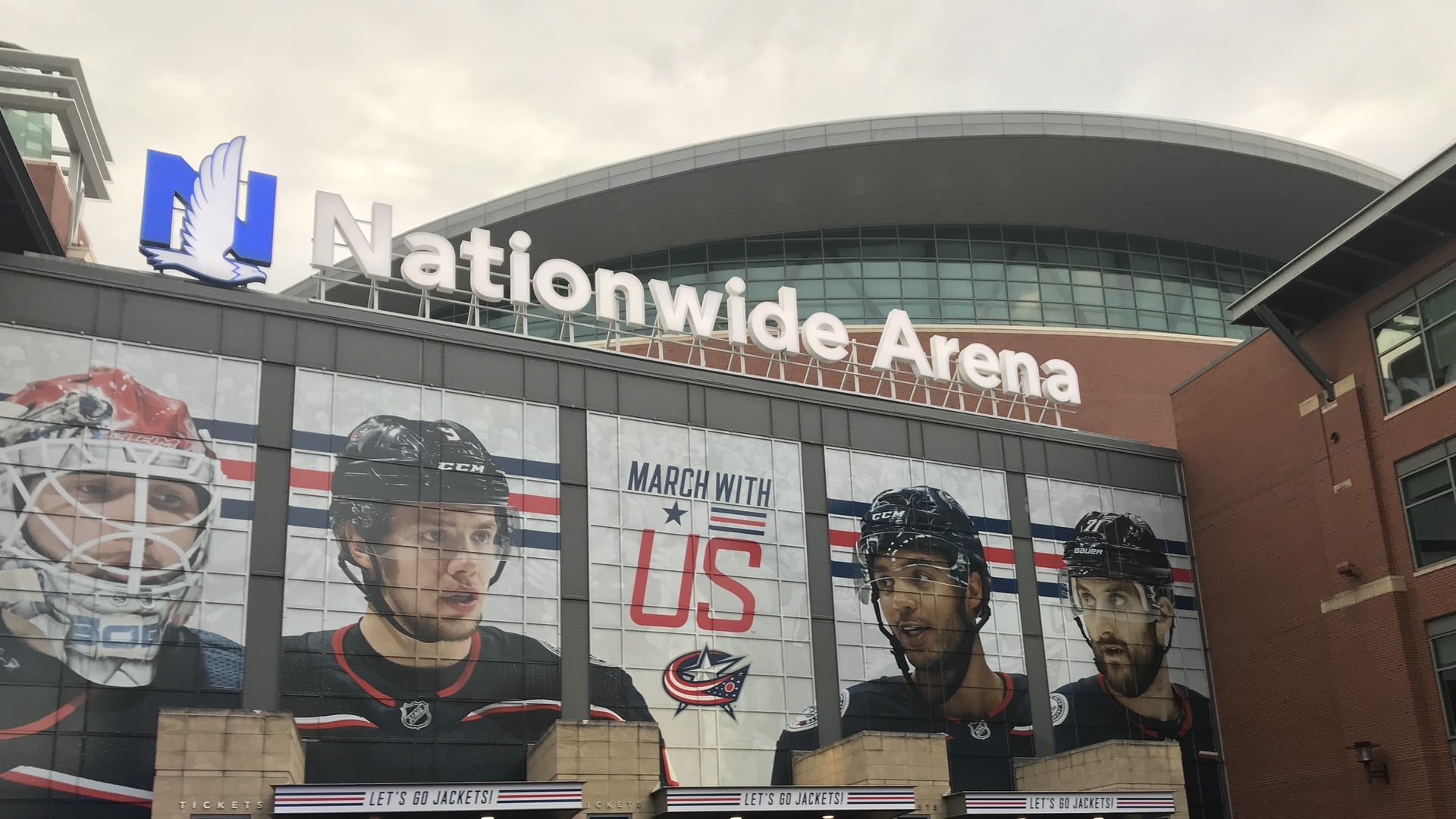 The Best Things To Do In Columbus This Month (October 2026) 1 The entrance to Nationwide Arena with Blue Jackets player banners above the doors
