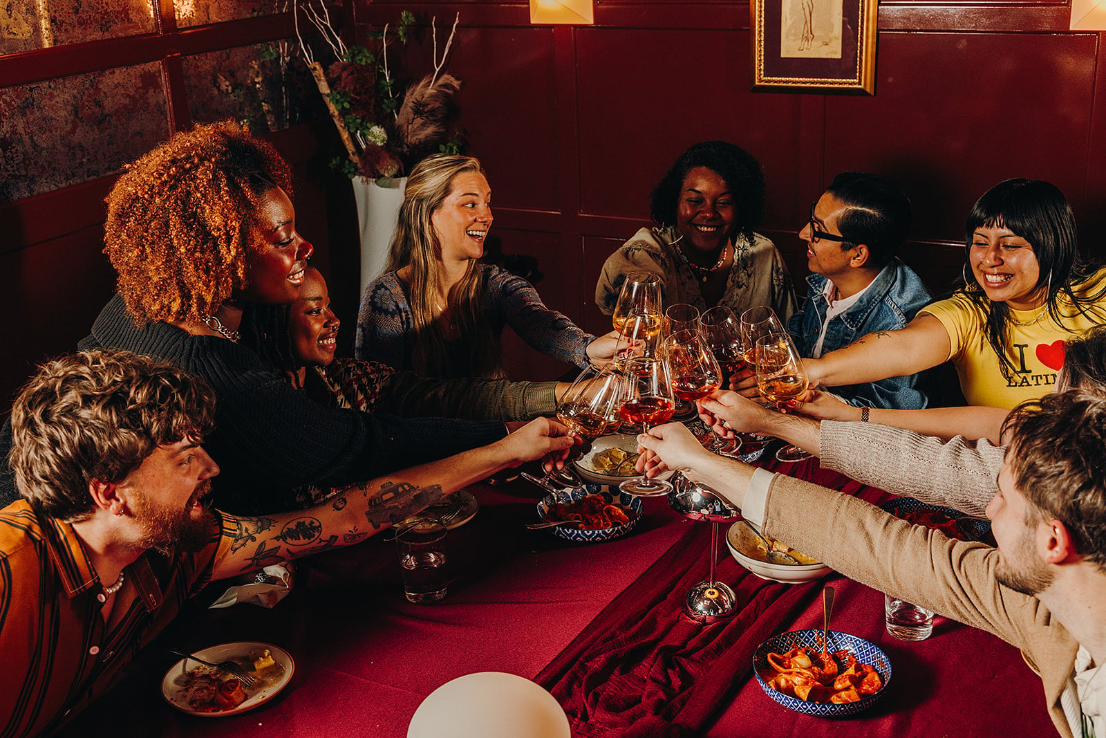 people drinking wine at dinner