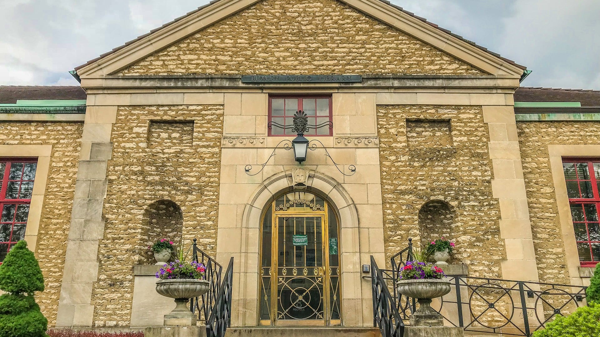 The Best Things To Do In Columbus This Weekend (October 30th–November 1st) 3 The stone front of the Bexley Public Library on East Main Street, with its name plaque above the arched brass doors