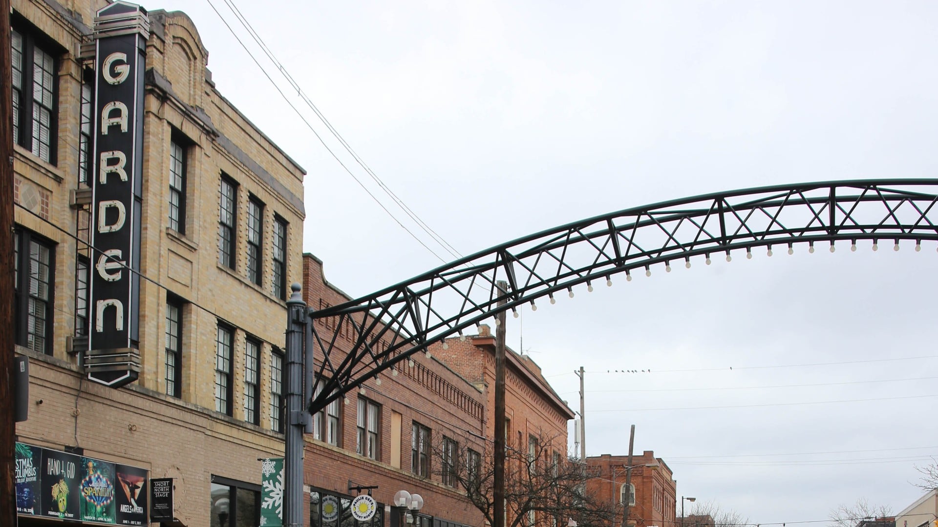 The Best Things To Do In Columbus This Weekend (October 23–25) 2 The vertical GARDEN blade sign on the Garden Theater with a Short North arch over High Street beside it