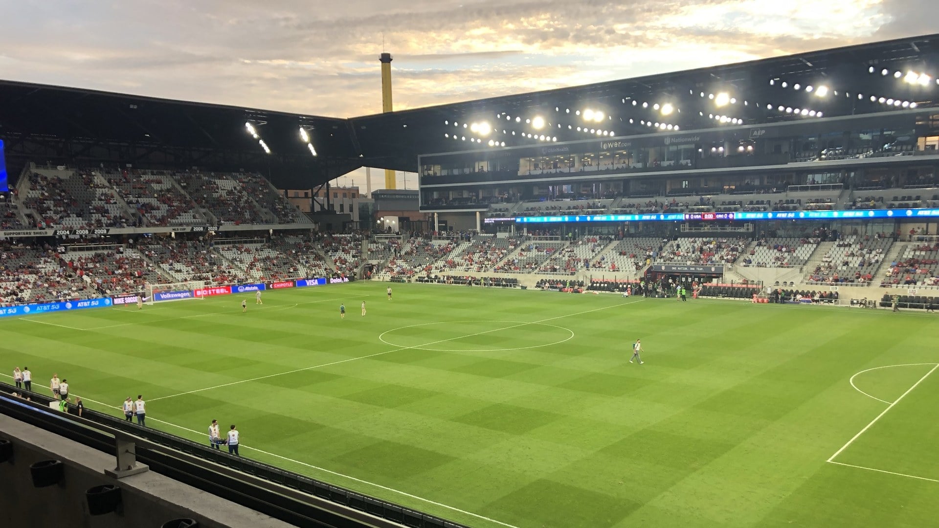 The Best Things To Do In Columbus This Weekend (October 23–25) 4 ScottsMiracle-Gro Field at dusk with the stadium lights on and the old smokestack rising beyond the roof