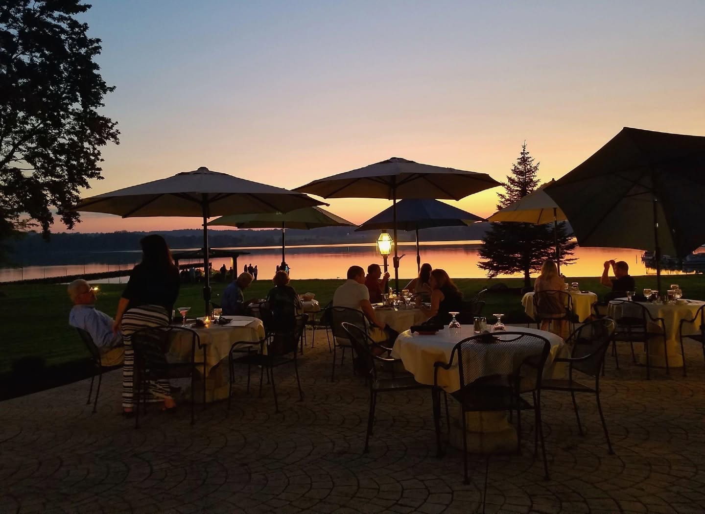 sunset on patio by lake